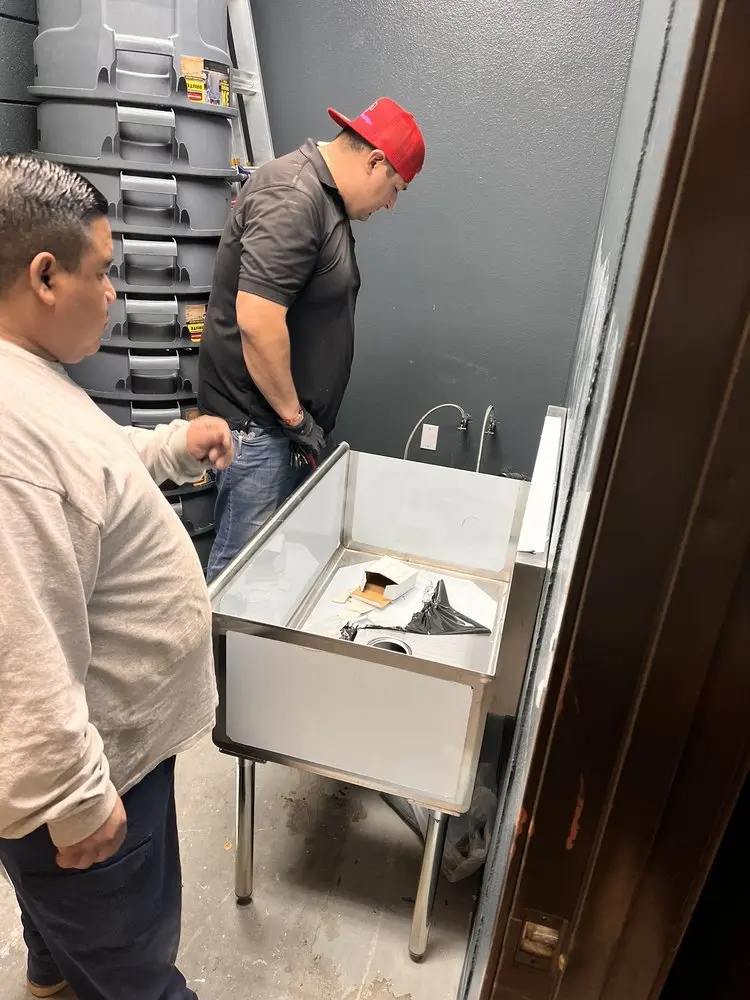 Commercial plumbing and sink installation in Arlington